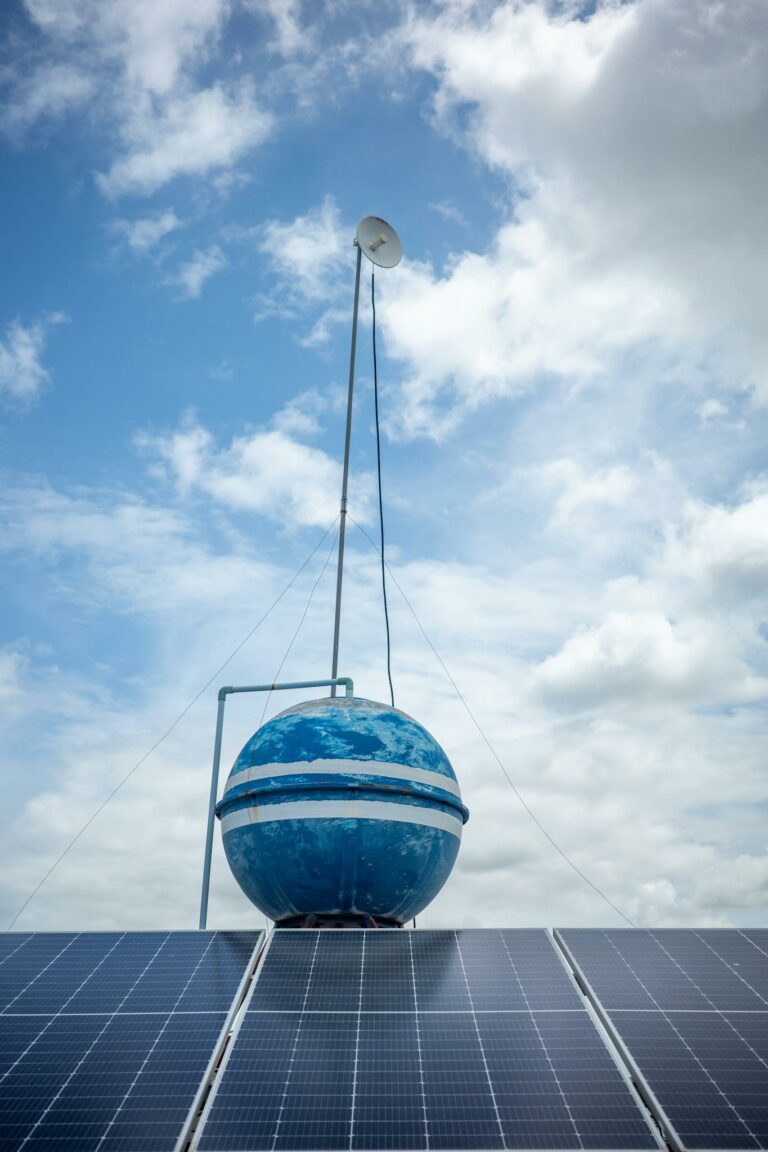 Globe and Solar Panels on Roof